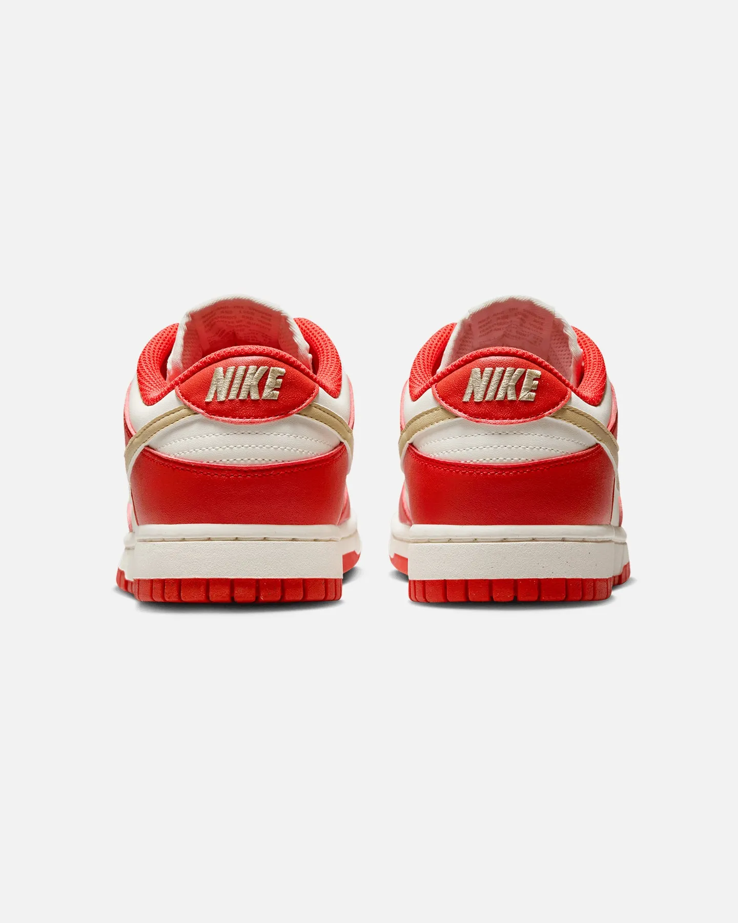 Nike Women's Dunk Low Next Nature "Light Crimson" Lt Crimson/Team Gold-Sail Kind Glow Leg Slim