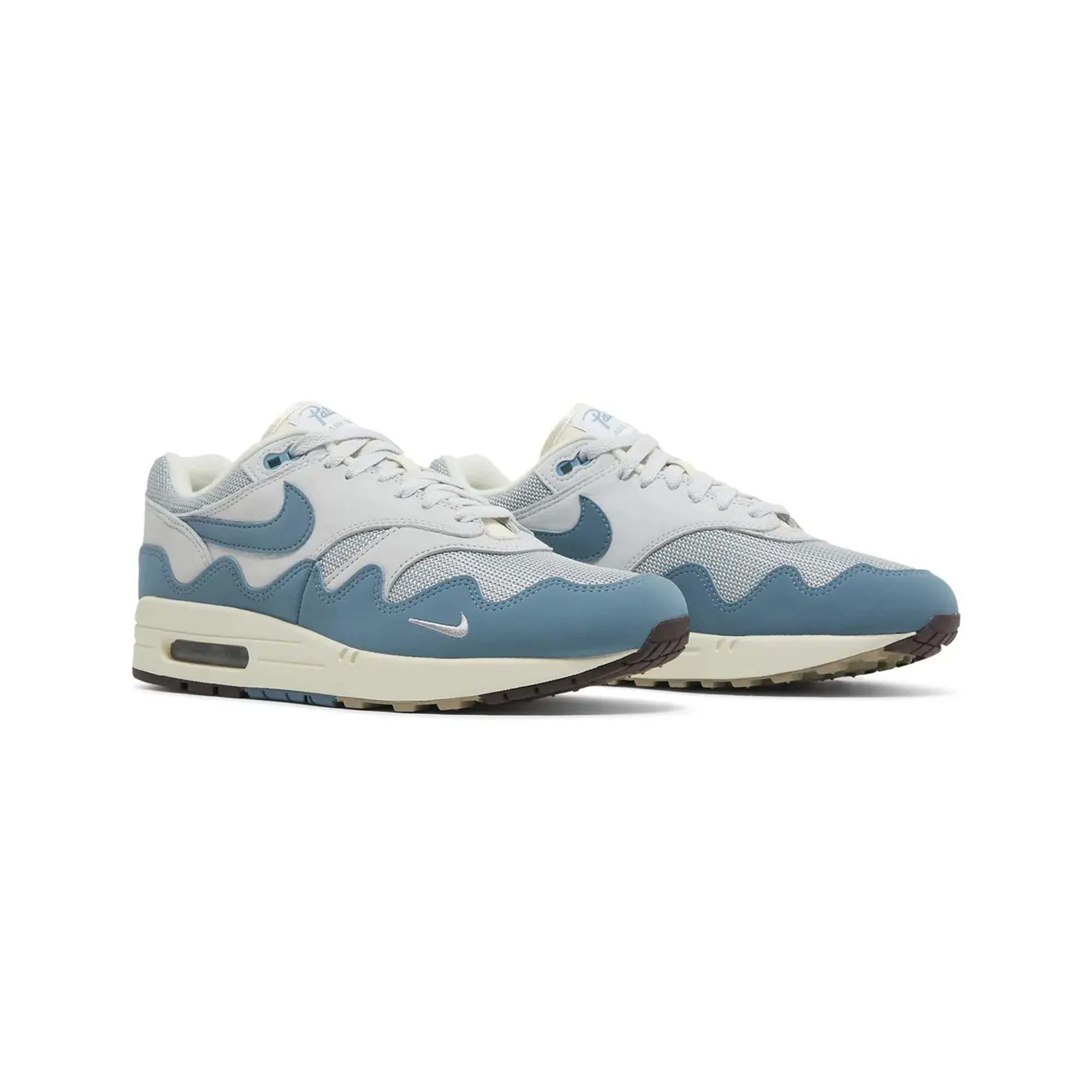 Nike Air Max 1 x Patta Waves 'Noise Aqua' (2021) Torsional Rigidity Tech running in a neighborhood