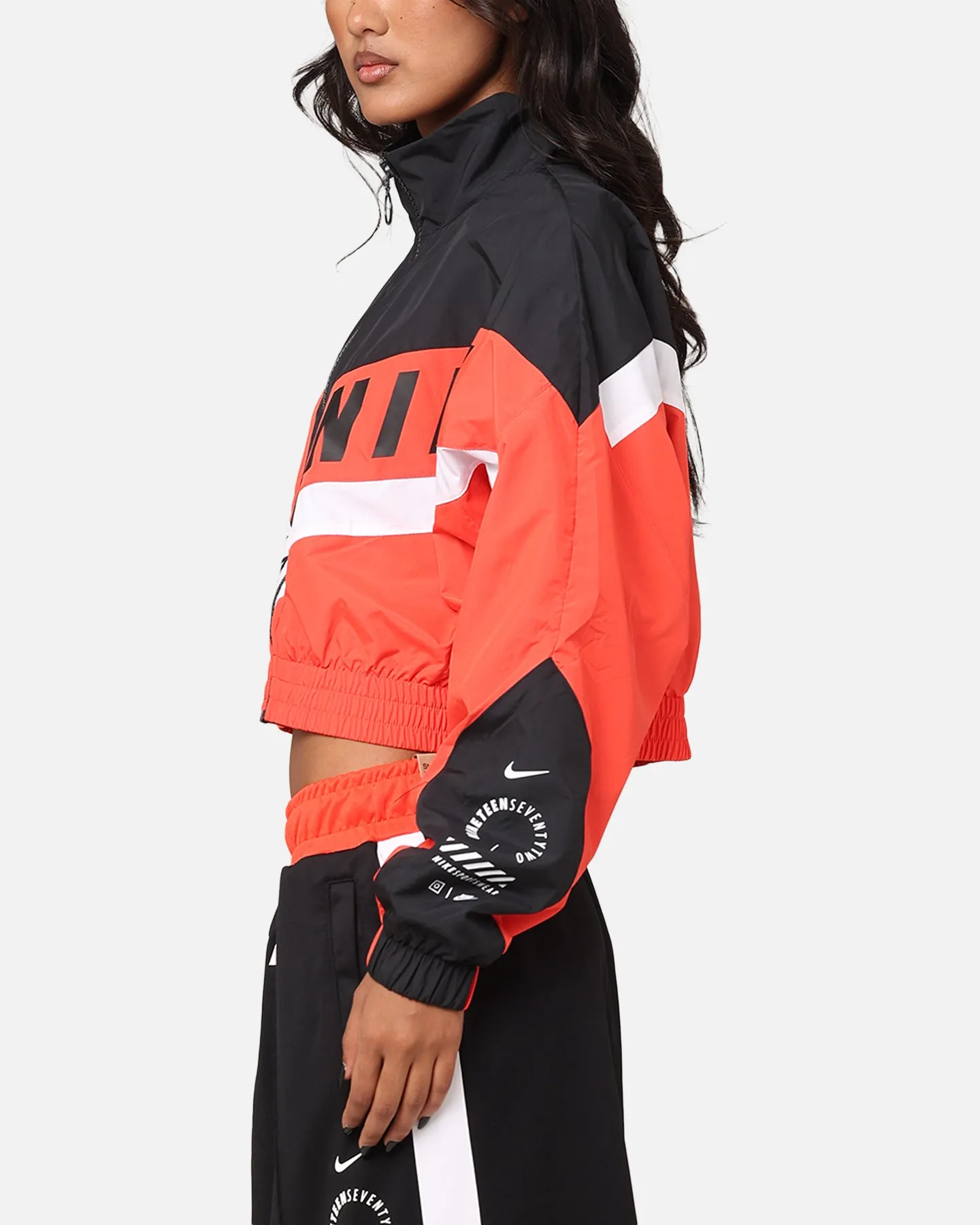 Nike Women's Sportswear Woven Street Jacket Light Crimson/Black/White Fleece suitable for beach vacations